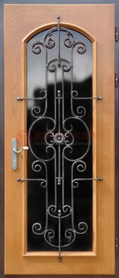Морозостойкая дверь со стеклом темного цвета и ковкой ДСК-63 в Луге
